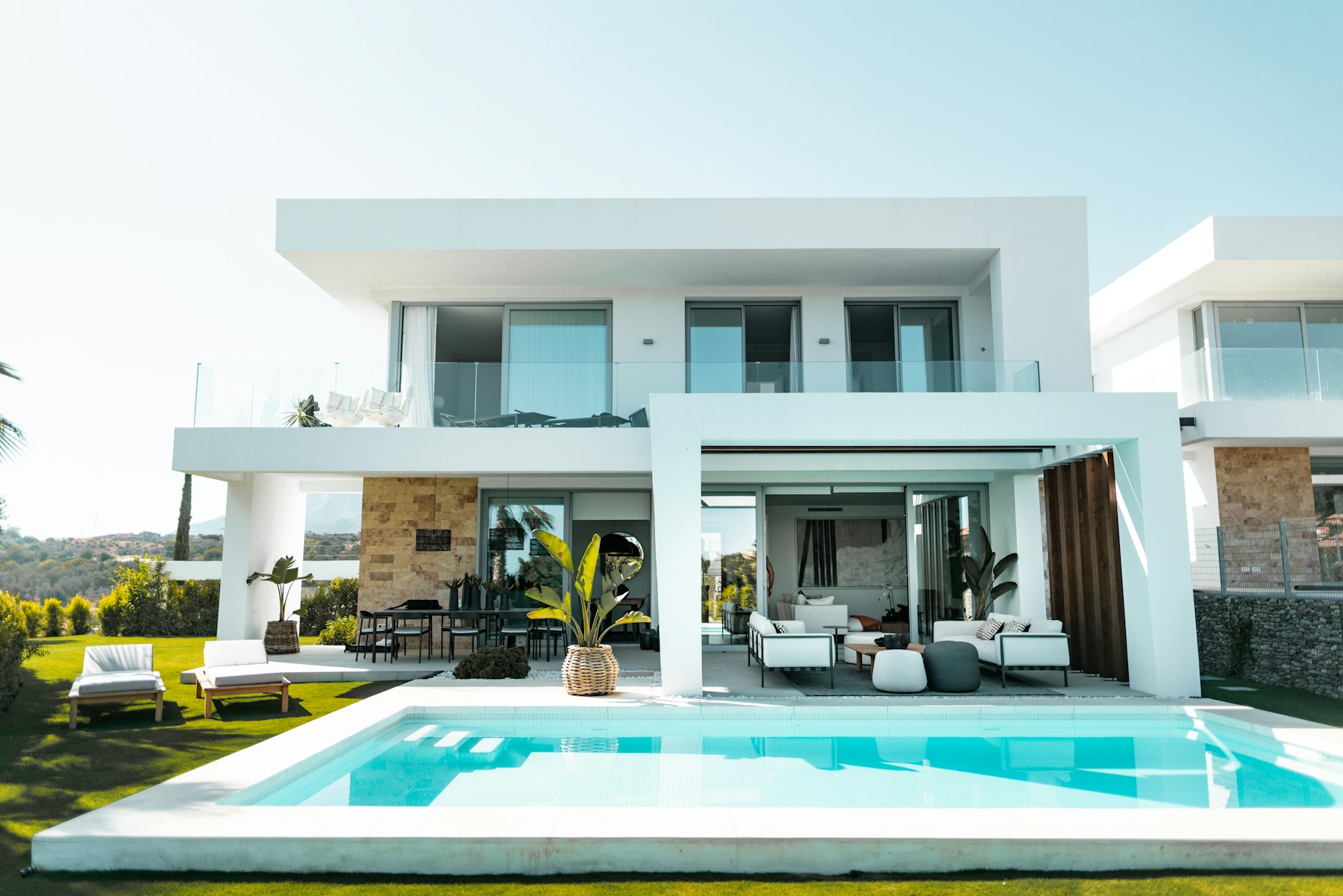 A peaceful pool beside a contemporary residence